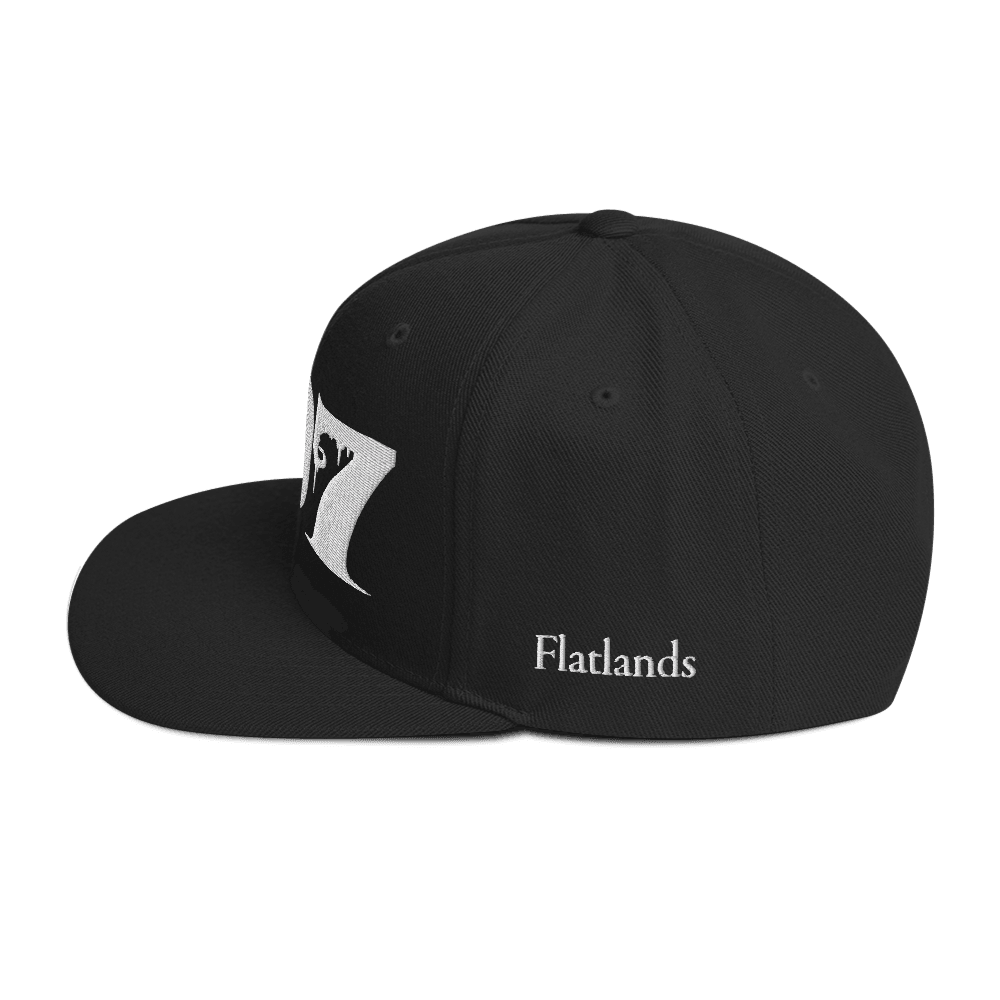 Side view of Deadpan Couture 707 Classic Snapback Hat in black with 'Flatlands' embroidered in white.