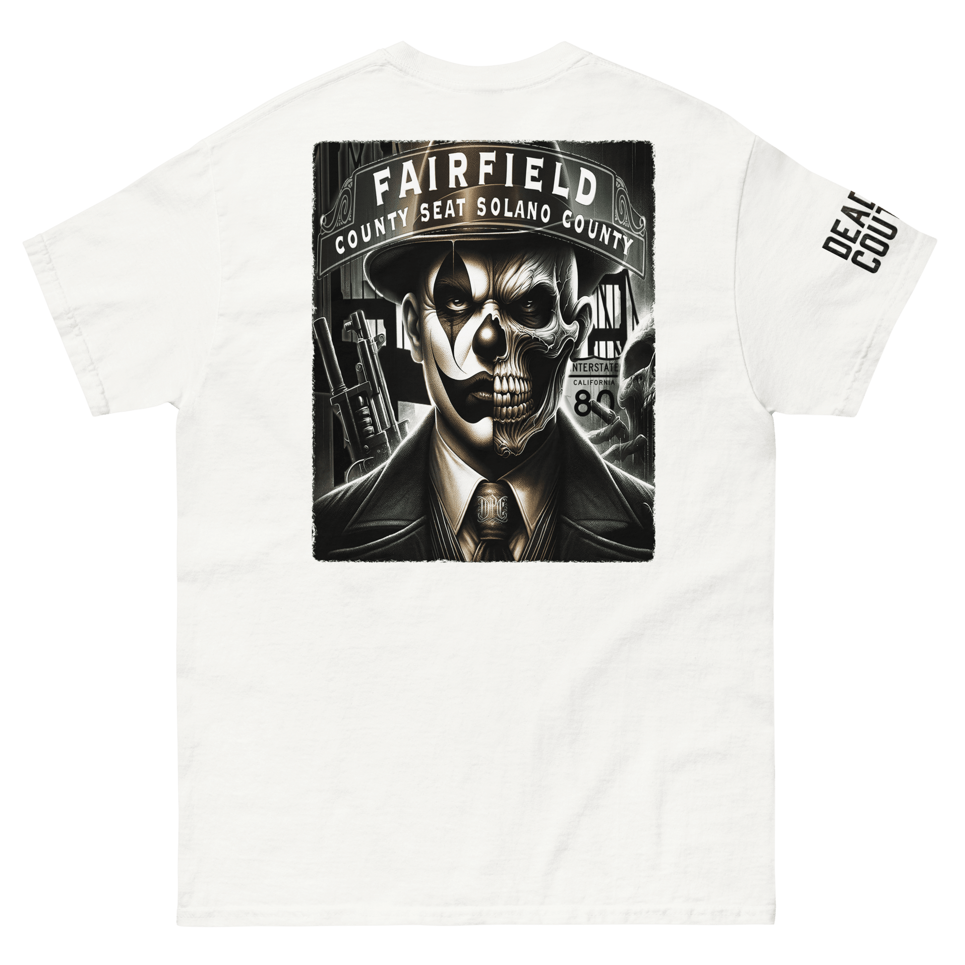 The back of the white shirt features a large graphic of a dual-faced skull in a suit, set against urban elements with the words "Fairfield, County Seat Solano County."