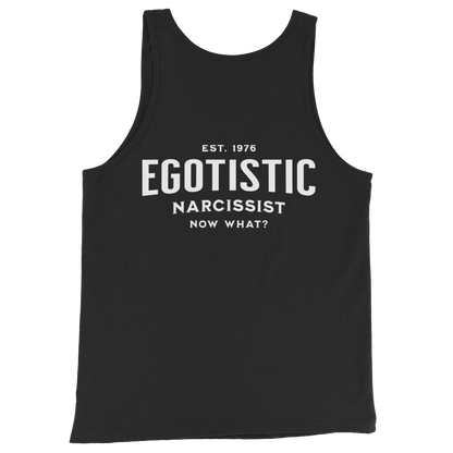 Deadpan Couture tank top with bold white text 'Egotistical Narcissist, Est. 1976, Now What?' on a black background.