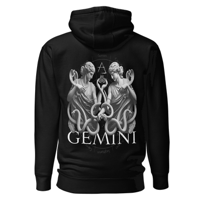 A black unisex premium hoodie with a striking Gemini zodiac design on the back, featuring twin figures and intricate details.