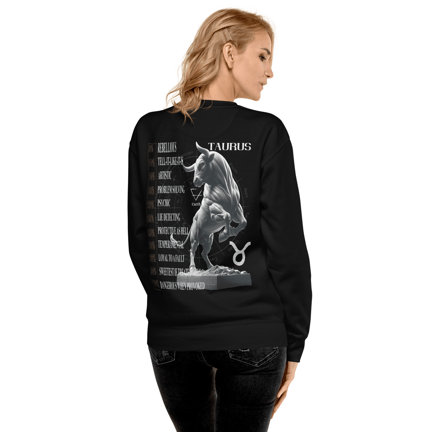 A woman with blonde hair, viewed from the back, is wearing the same black Deadpan Couture sweatshirt. The back shows the same intricate Taurus bull statue and a list of Taurus attributes.