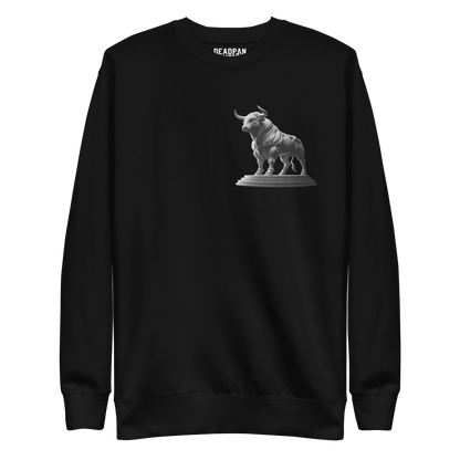 The front of the black Deadpan Couture sweatshirt displays a small, detailed illustration of a Taurus bull statue on the left chest area. The design is minimalist and monochrome.