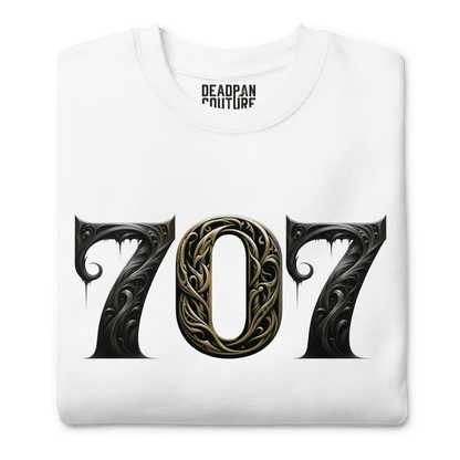 White sweatshirt featuring a bold "707" graphic on the front, designed with intricate baroque elements, showcasing Deadpan Couture's edgy streetwear style.